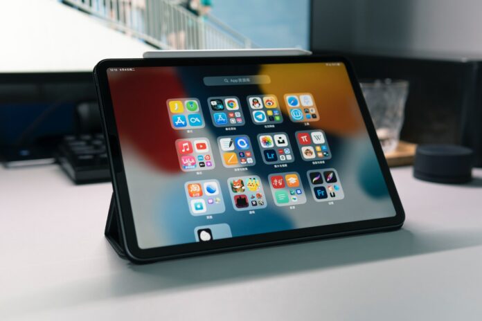 a tablet computer sitting on top of a table