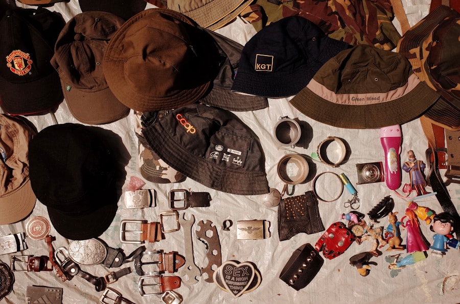 a table topped with lots of hats and other items